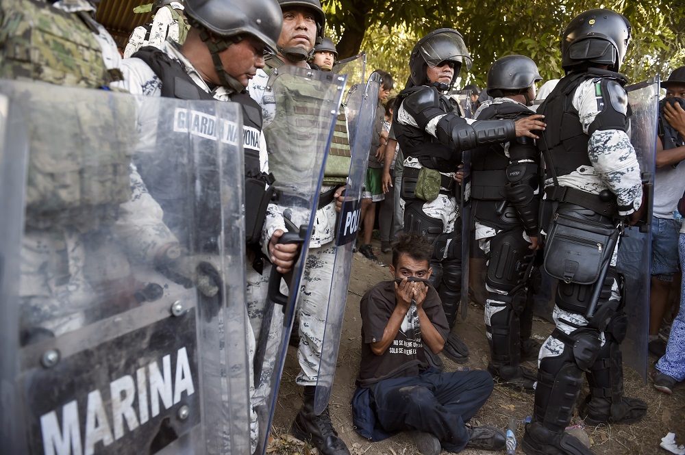 Central American migrants u00e2u20acu201d heading in a caravan to the US u00e2u20acu201d are blocked by members of Mexican National Guard in Ciudad Hidalgo, Chiapas State, Mexico January 23, 2020. u00e2u20acu201d AFP pic