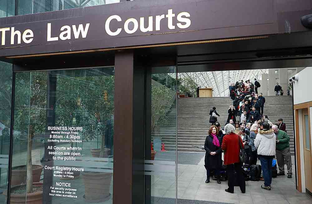 Members of the media and public line up outside a British Columbia Supreme courtroom for the extradition trial for Huawei Technologies CFO Meng Wanzhou in Vancouver, Canada January 20, 2020. u00e2u20acu201d AFP pic