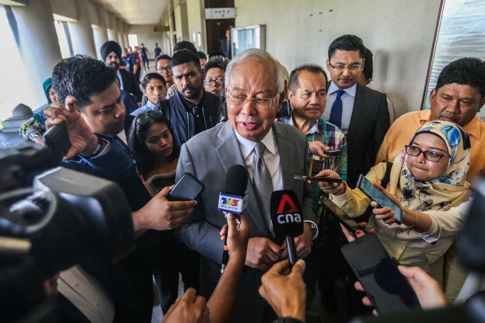 Datuk Seri Najib Razak speaks to reporters at the Kuala Lumpur High Court January 8, 2020. u00e2u20acu2022 Picture by Firdaus Latif