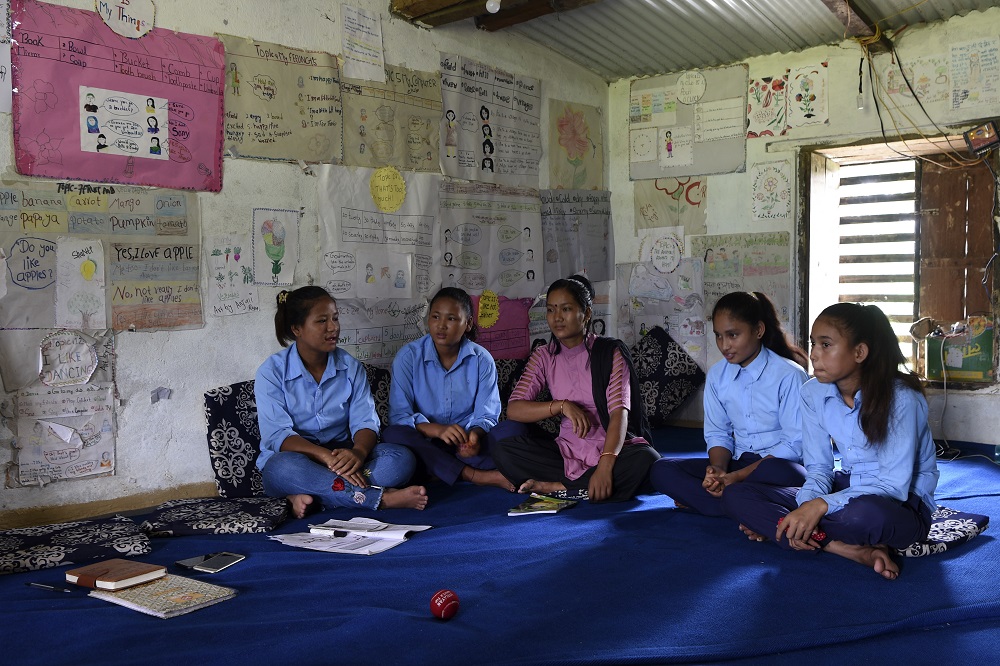 In this photograph taken on September 12, 2019 Asha Charti Karki (centre), who got married at age 16, mentors young girls on the importance of education in Barahataal in Surkhet District, some 520km west of Kathmandu. u00e2u20acu2022 AFP pic