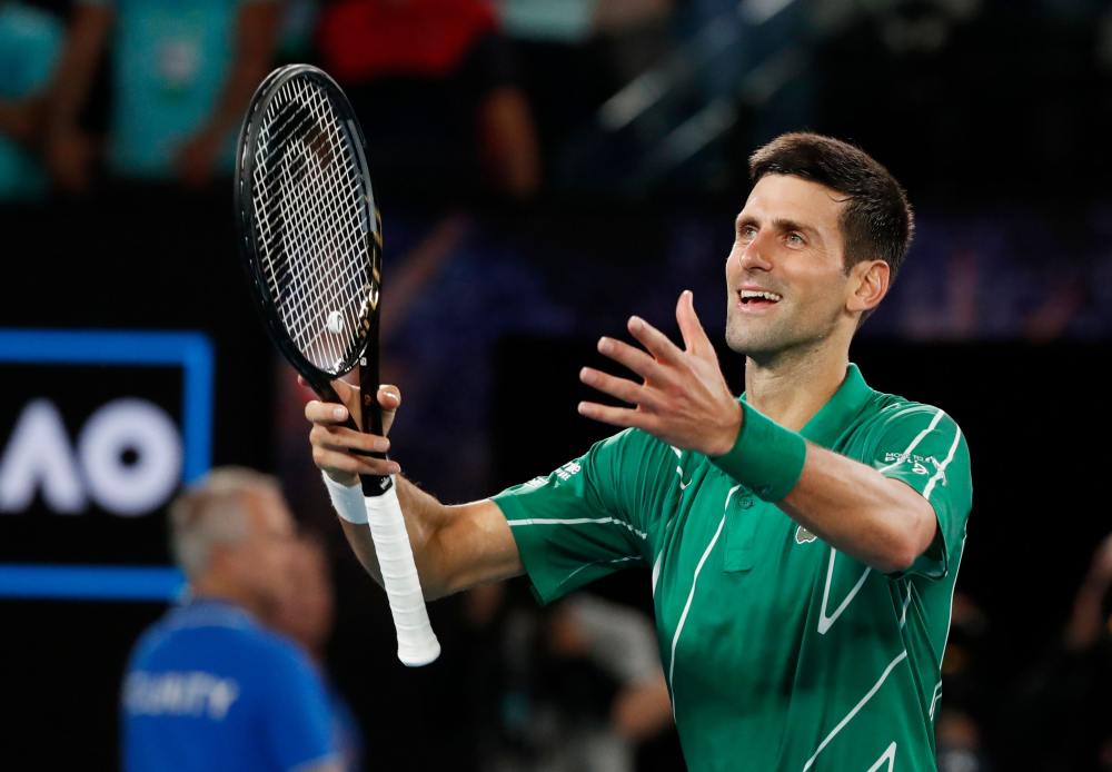 Serbia's Novak Djokovic celebrates after winning his match against Germany's Jan-Lennard Struff in Melbourne January 20, 2020. u00e2u20acu2022 Reuters pic
