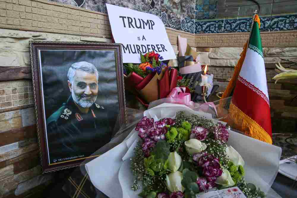 Flowers and posters of Iranian general Qasem Soleimani are pictured at the table of condolence outside the Iranian Embassy in Kuala Lumpur January 7, 2020. u00e2u20acu2022 Picture by Yusof Mat Isa