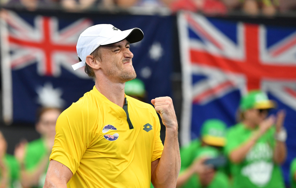 John Millman of Australia celebrates winning his match against Felix Auger-Aliassime of Canada during day 3 of the ATP Cup tennis tournament at Pat Rafter Arena in Brisbane January 5, 2020. u00e2u20acu201d Picture by AAP Image/Darren England via Reuters