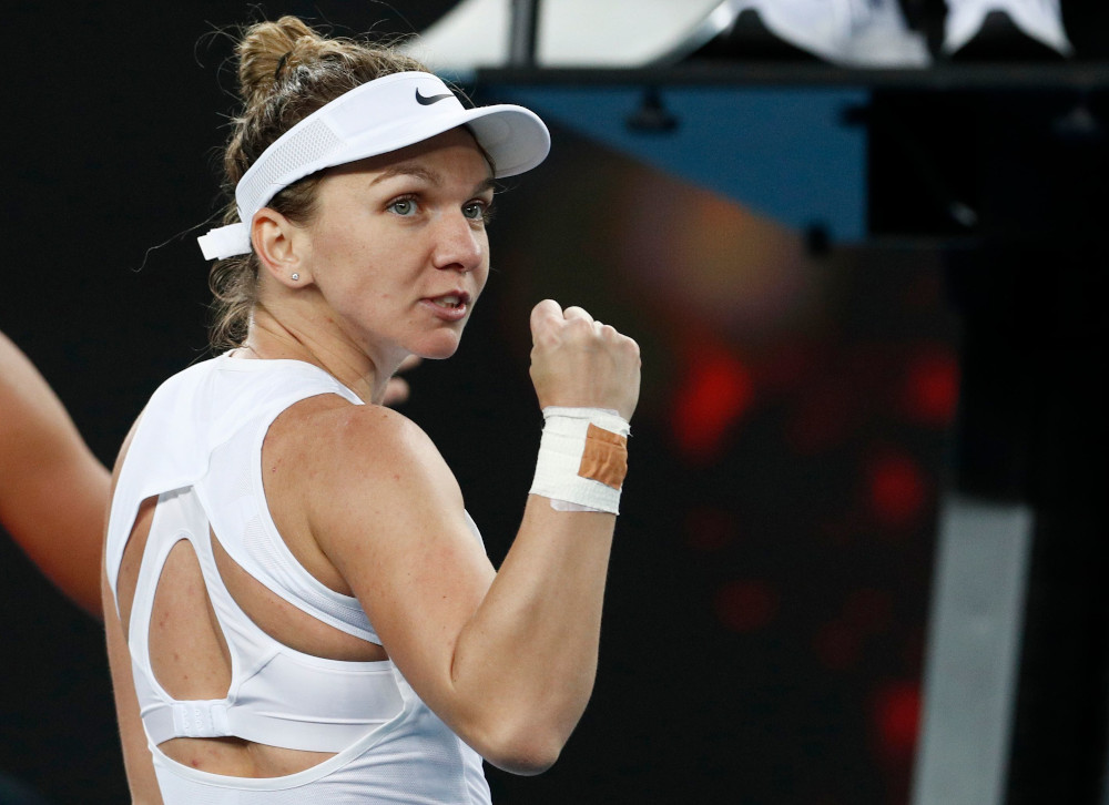 Romaniau00e2u20acu2122s Simona Halep reacts during the Australian Open first round match against Jennifer Brady of the US at Melbourne Park, Melbourne January 21, 2020. u00e2u20acu201d Reuters pic