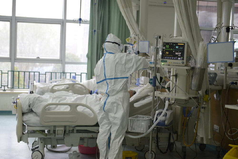 A picture released by the Central Hospital of Wuhan shows medical staff attending to a patient in Wuhan on an unknown date. u00e2u20acu201d Picture by the Central Hospital of Wuhan via Weibo/Handout via Reuters