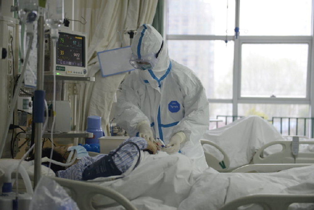 A picture released by the Central Hospital of Wuhan shows medical staff attending to a patient in Wuhan on an unknown date. u00e2u20acu201d Picture by the Central Hospital of Wuhan via Weibo/Handout via Reuters