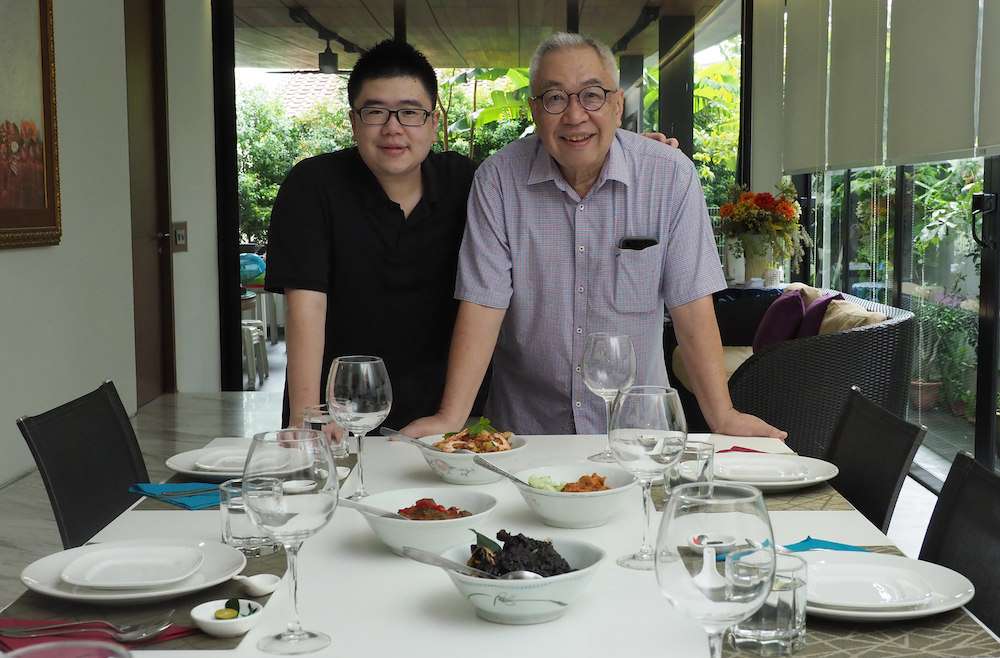 David Leong (left) and his father Raymond Leong run The Ampang Kitchen, a home-based private dining business. — TODAY pic