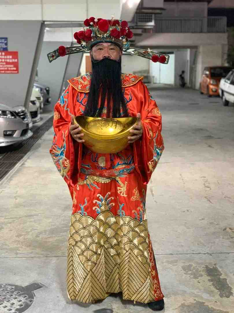 It takes Steven Chan less than 30 minutes to dress up as the God of Prosperity. — Picture courtesy of Steven Chan