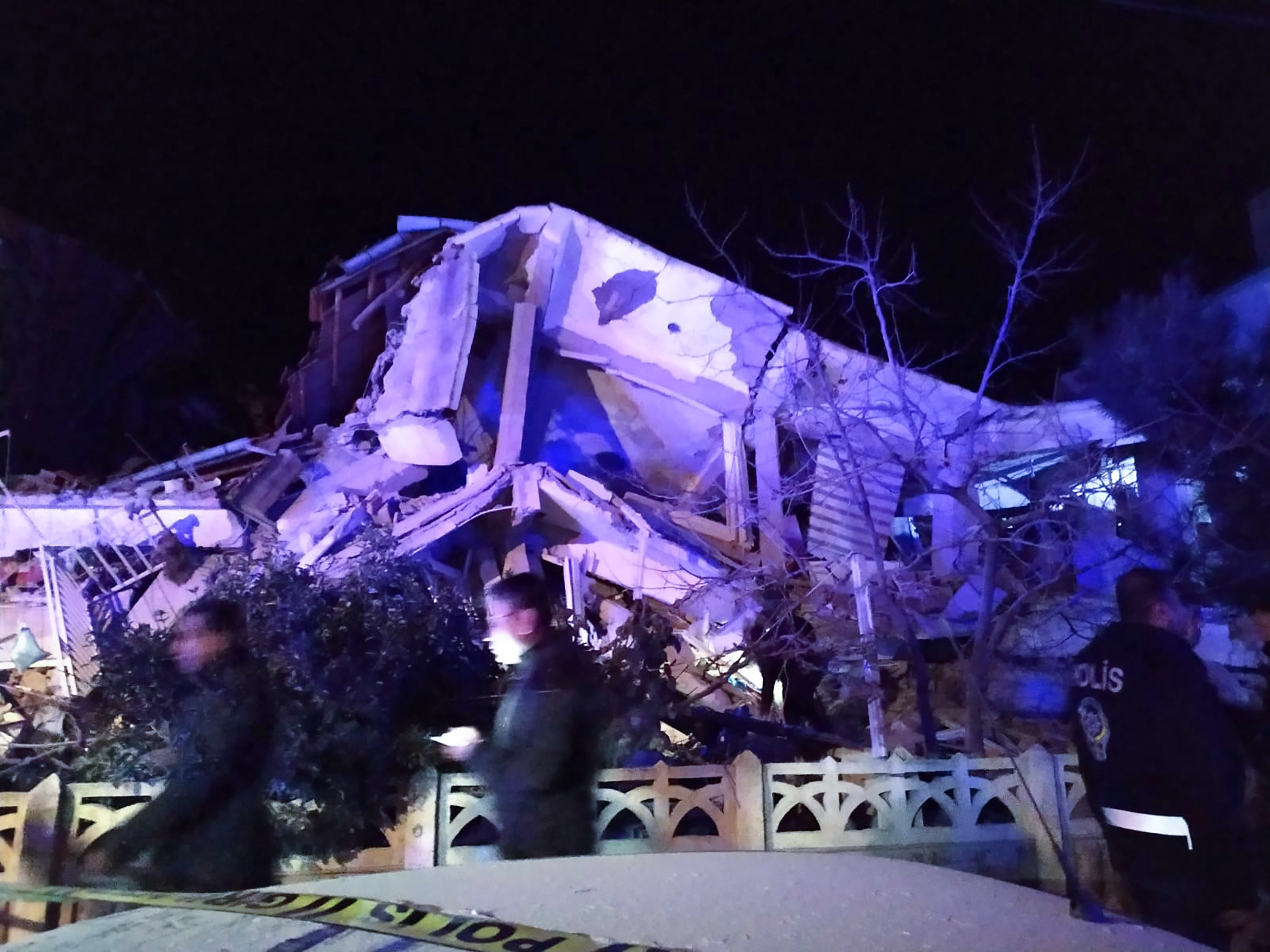 Turkish officials and police arrive at the scene of a collapsed building following a 6.8 magnitude earthquake in Elazig, eastern Turkey on January 24, 2020, killing several people according to the Turkish interior ministry. u00e2u20acu201d AFP pic