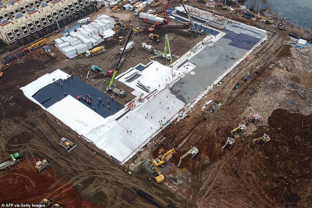 This aerial photo shows excavators and trucks at the construction site of a new hospital being built to treat patients from a deadly virus outbreak in Wuhan in Chinau00e2u20acu2122s central Hubei province on January 27, 2020. u00e2u20acu201d AFP pic