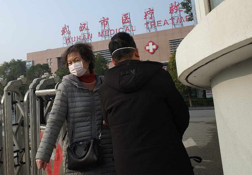 A woman leaves the Wuhan Medical Treatment Centre, where a man who died from a respiratory illness was confined, in the city of Wuhan, Hubei province January 12, 2020. u00e2u20acu201d AFP pic