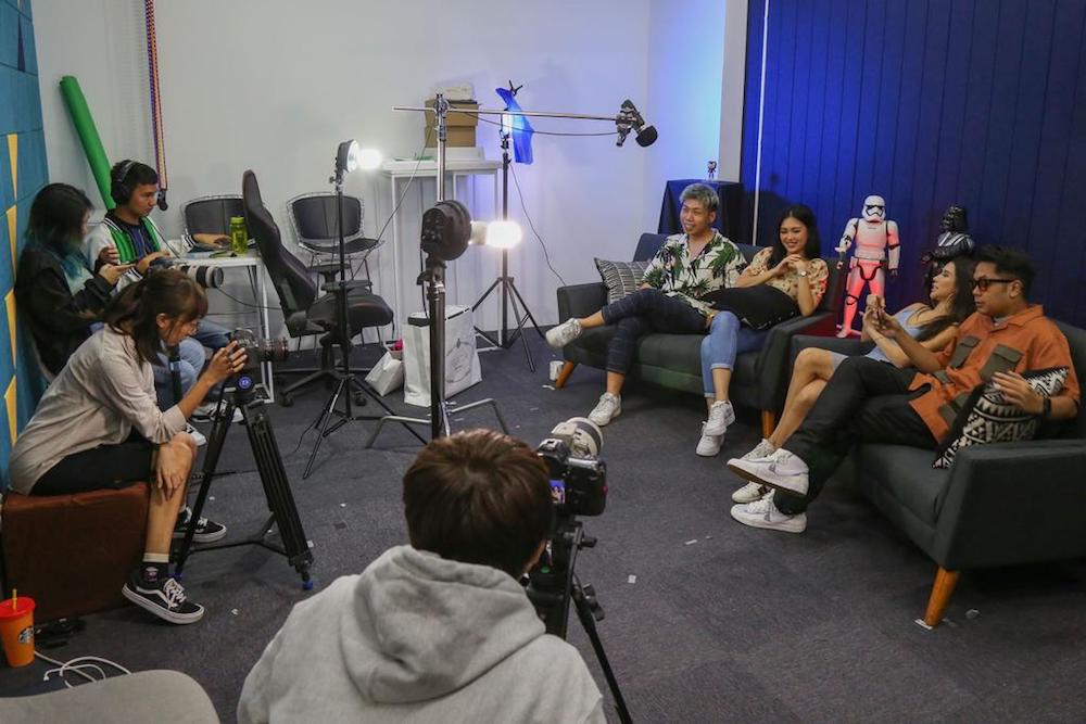 (4th right) Johnathan Chua seen here on set during a filming session for one of the episodes of the online talk show, Real Talk. u00e2u20acu201d TODAY pic