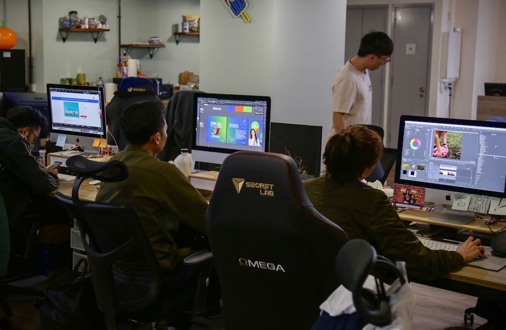 A relatively new entrant is a 30-man content agency and media group, Grvty Media. Employees of the company is seen here working on new content at their office along 62 Bendemeer Road. — TODAY pic