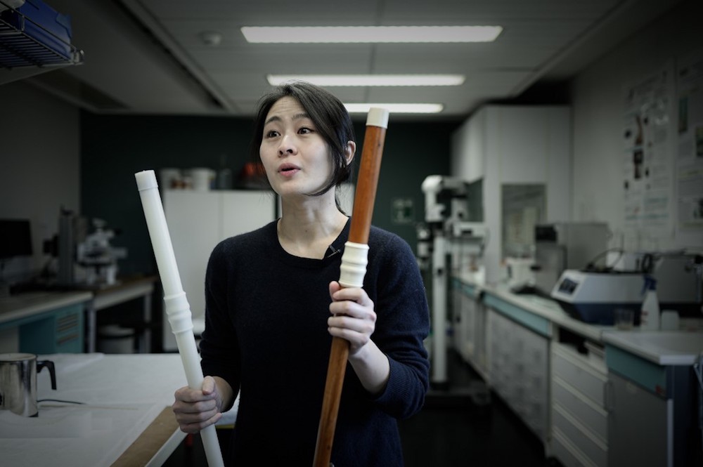 Musician Mina Jang holds the 3D-printing replica (left) of a wooden transverse flute (right) at the music lab of the Music Museum at the Philarmonie in Paris January 17, 2020. u00e2u20acu201d AFP pic