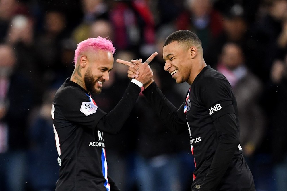 Paris Saint-Germainu00e2u20acu2122s Kylian Mbappe is congratulated by Neymar after scoring a goal during the L1 match with Montpellier Herault at Parc des Princes in Paris February 1, 2020. u00e2u20acu201d AFP pic