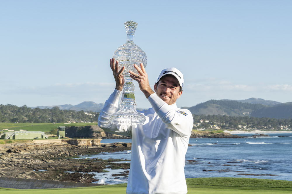 Nick Taylor hoists the trophy during the final round of the AT&T Pebble Beach Pro-Am golf tournament at Pebble Beach Golf Links, February 9, 2020. u00e2u20acu201d Kyle Terada-USA TODAY Sports via Reuters