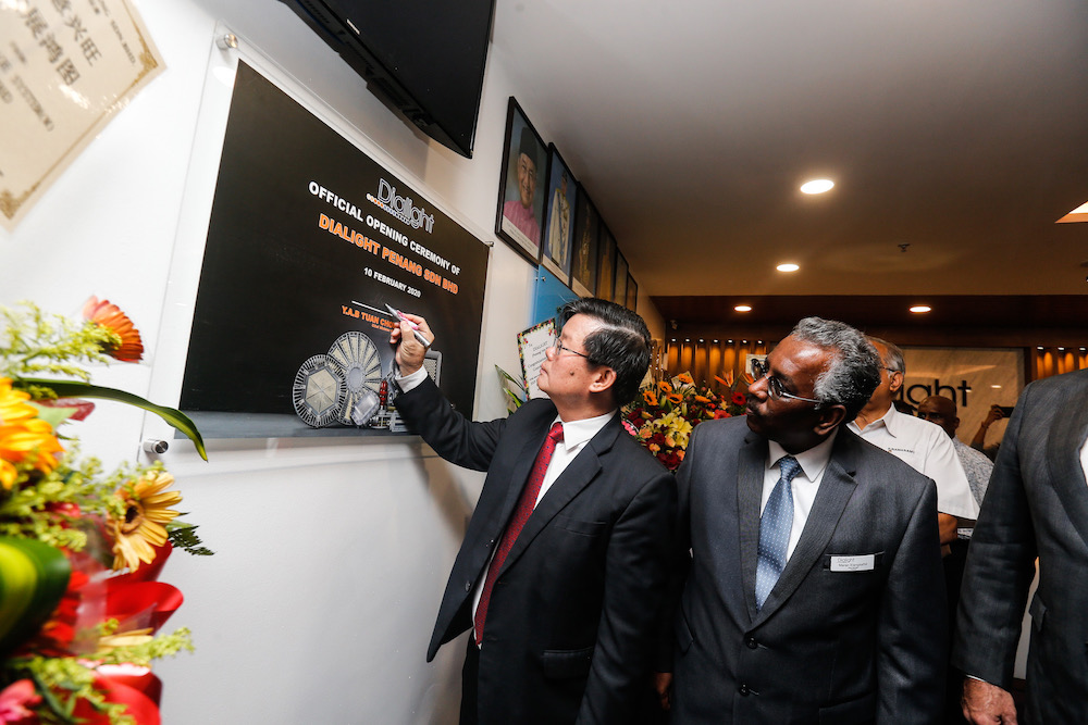 Penang Chief Minister Chow Kon Yeow signs the plaque during the opening ceremony of Dialight Penang Plant in Juru February 10, 2020. u00e2u20acu201d Picture by Sayuti Zainudin