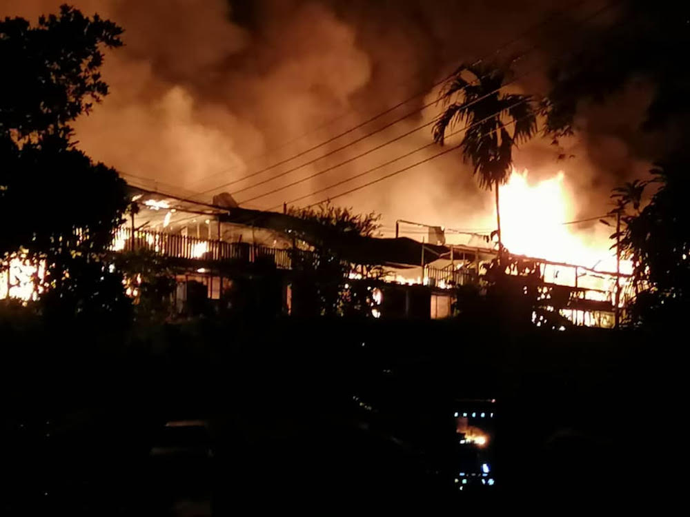 A pre-dawn fire at its height at Rumah Dingon Megong longhouse February 10, 2020. u00e2u20acu201d Picture courtesy of Sibu Bomba