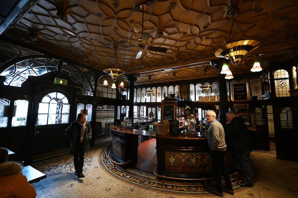 People drink at The Philharmonic Dining Rooms pub, in Liverpool, north west England. u00e2u20acu201d AFP pic