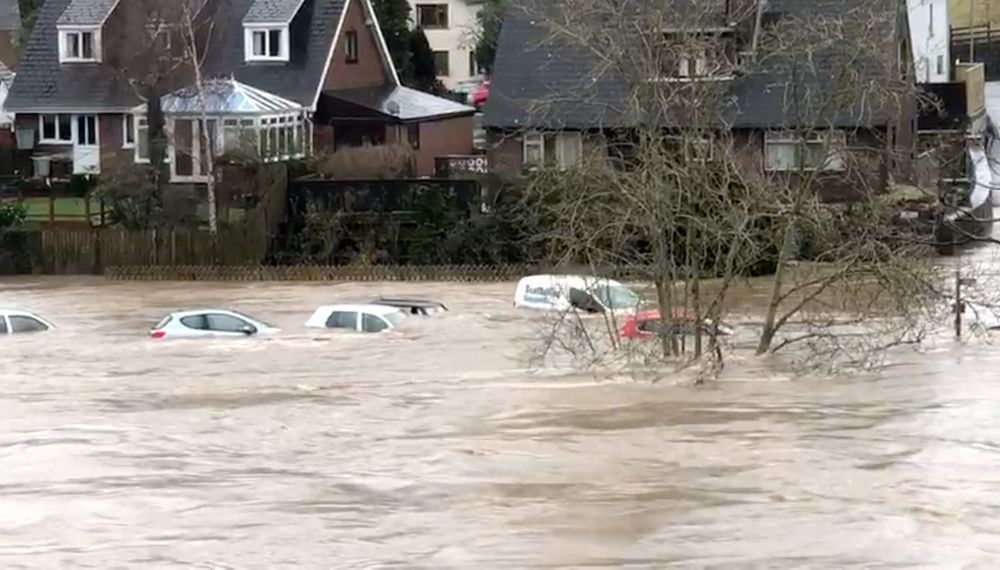 Cars are swept away by floodwaters after the River Wye broke its banks, in Hay-on-Wye, Wales February 16, 2020 in this screen grab obtained from a social media video. u00e2u20acu201d Jonathan Sayce picture via Reuters
