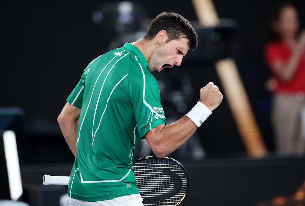 Serbiau00e2u20acu2122s Novak Djokovic celebrates after his semi-final match against Switzerlandu00e2u20acu2122s Roger Federer at the Australian Open in Melbourne January 30, 2020. u00e2u20acu201d Reuters pic