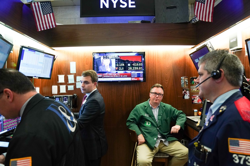 Traders work at the New York Stock Exchange January 31, 2020. u00e2u20acu201d Reuters pic