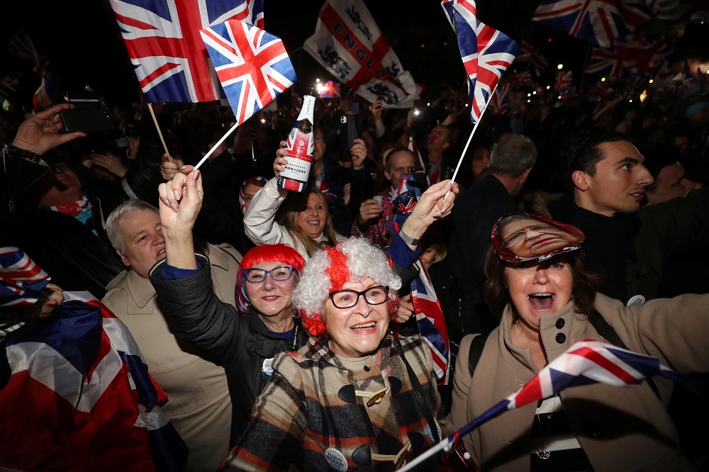 People celebrate in Parliament Square on Brexit day in London January 31, 2020. u00e2u20acu201d Reuters pic