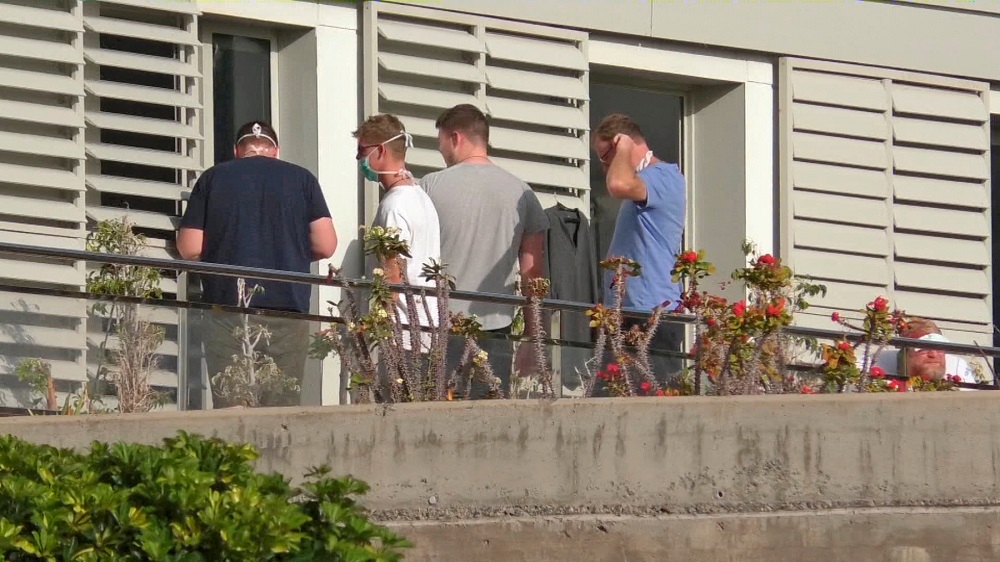 People wearing surgical masks are seen at the balcony of a hospital in the remote Spanish island of La Gomera, where the first case of coronavirus in the country has been confirmed January 31, 2020. u00e2u20acu201d Picture by Acfi Press via Reuters