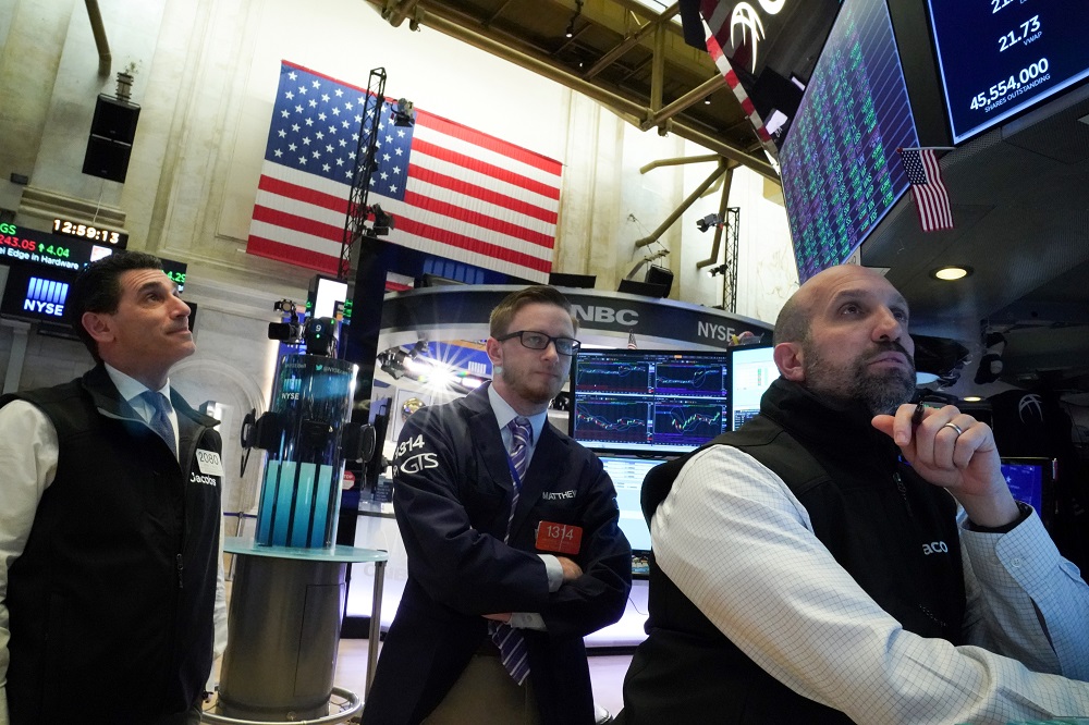 Traders work at the New York Stock Exchange February 5, 2020. u00e2u20acu201d Reuters pic