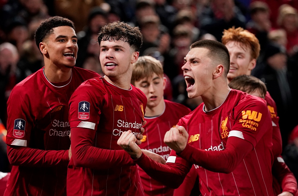 Liverpool's Neco Williams celebrates with team mates after Shrewsbury Town's Ro-Shaun Williams scored an own goal and the first for Liverpool at Anfield in Liverpool February 4, 2020. u00e2u20acu201d Reuters pic