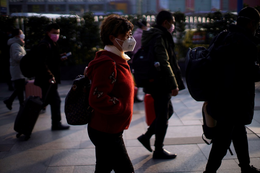 Passengers wearing masks walk at the Shanghai railway station in China, as the country is hit by an outbreak of the novel coronavirus, February 9, 2020. u00e2u20acu201d Reuters pic