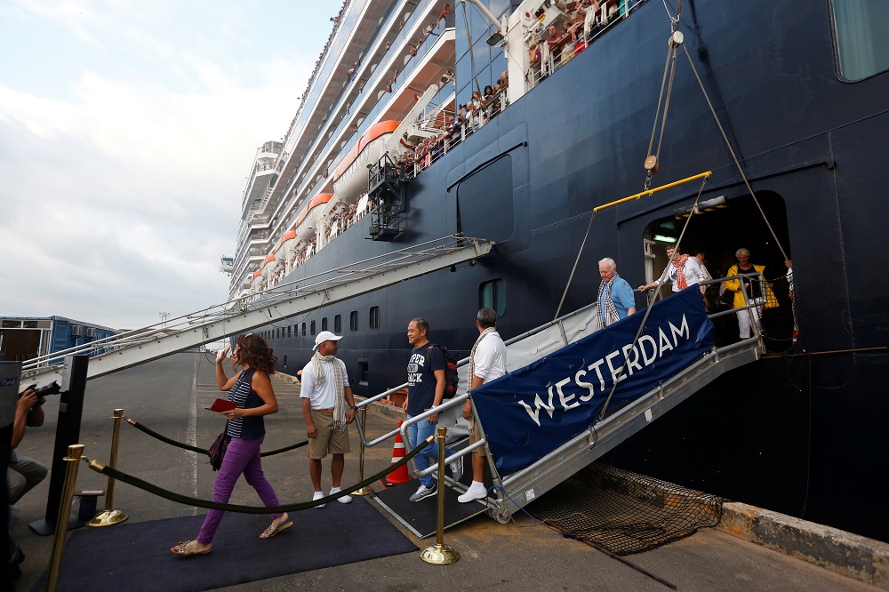 Passengers leave of MS Westerdam, a cruise ship that spent two weeks at sea after being turned away by five countries over fears that someone aboard might have the coronavirus, as it docks in Sihanoukville, Cambodia February 14, 2020. u00e2u20acu201d Reuters pic