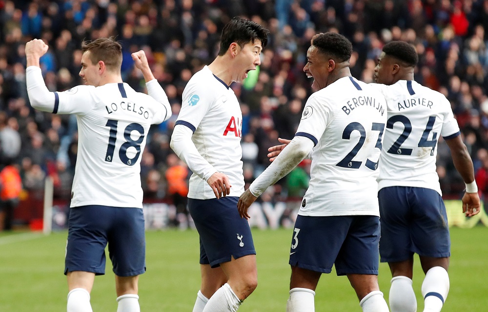 Tottenham Hotspur's Son Heung-min celebrates scoring their third goal with Steven Bergwijn and teammates at Villa Park in Birmigham February 16, 2020. u00e2u20acu201d Action Images via Reuters