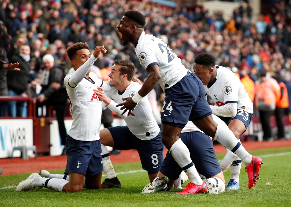 Tottenham Hotspur's Son Heung-min celebrates scoring their third goal with Steven Bergwijn and teammates at Villa Park in Birmigham February 16, 2020. u00e2u20acu201d Action Images via Reuters