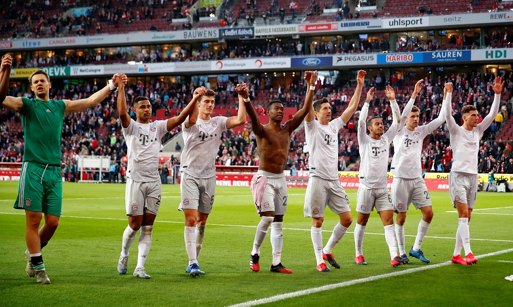 Bayern Munich players celebrate in front of their fans after the match at Rhein Energie Stadion in Cologne February 16, 2020. u00e2u20acu201d Reuters pic