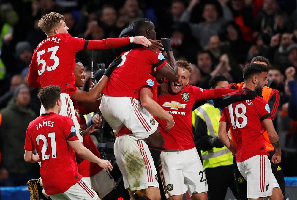 Manchester Unitedu00e2u20acu2122s Harry Maguire celebrates scoring their second goal with Luke Shaw, Bruno Fernandes and teammates at Stamford Bridge in London February 17, 2020. u00e2u20acu201d Action Images via Reuters