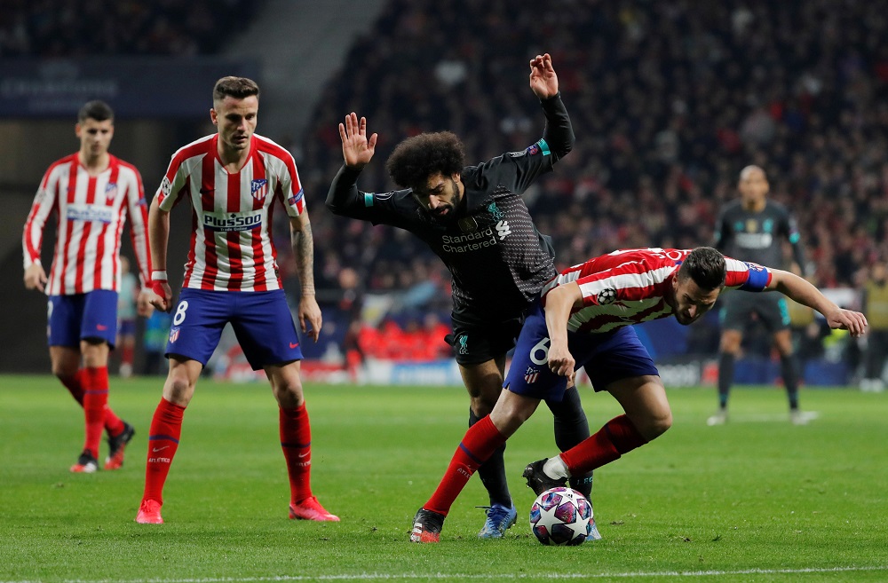 Liverpoolu00e2u20acu2122s Mohamed Salah in action with Atletico Madridu00e2u20acu2122s Koke and Saul Niguez at the Wanda Metropolitano stadium in Madrid February 18, 2020. u00e2u20acu201d Reuters pic