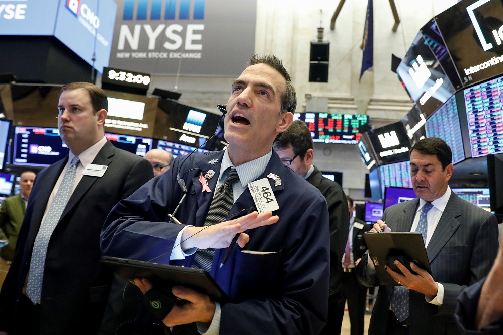 Traders work on the floor at the New York Stock Exchange February 25, 2020. u00e2u20acu201d Reuters pic