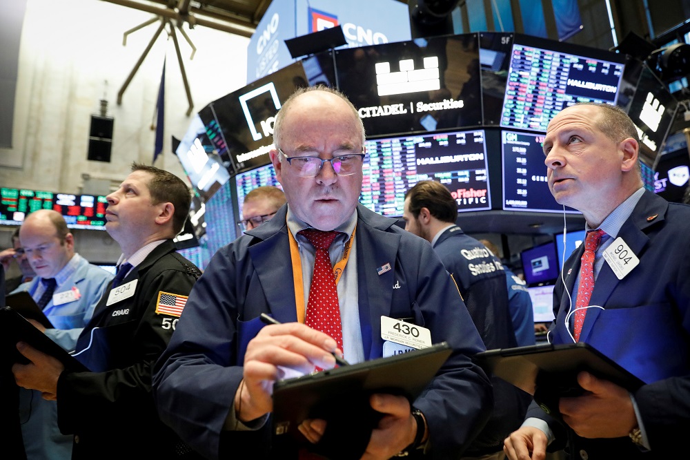 Traders work on the floor at the New York Stock Exchange February 25, 2020. u00e2u20acu201d Reuters pic