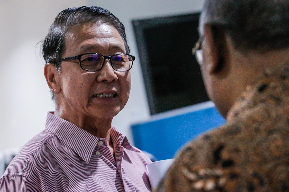 Gabungan Bertindak Malaysia secretary-general Stanley Yong (left) speaks to ABIM chairman Datuk Wan Ramli Wan Daud following a press conference in Kuala Lumpur February 6, 2020. — Picture by Hari Anggara