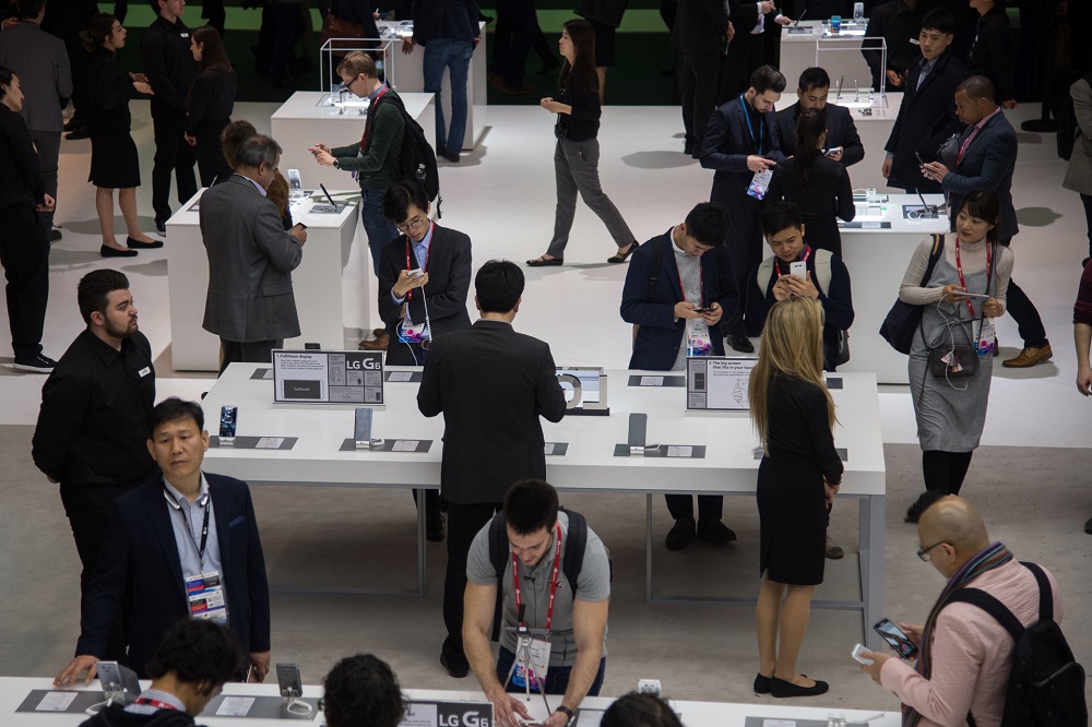 Visitors testing various LG devices at companyu00e2u20acu2122s booth during the Mobile World Congress in 2017. u00e2u20acu201d AFP pic