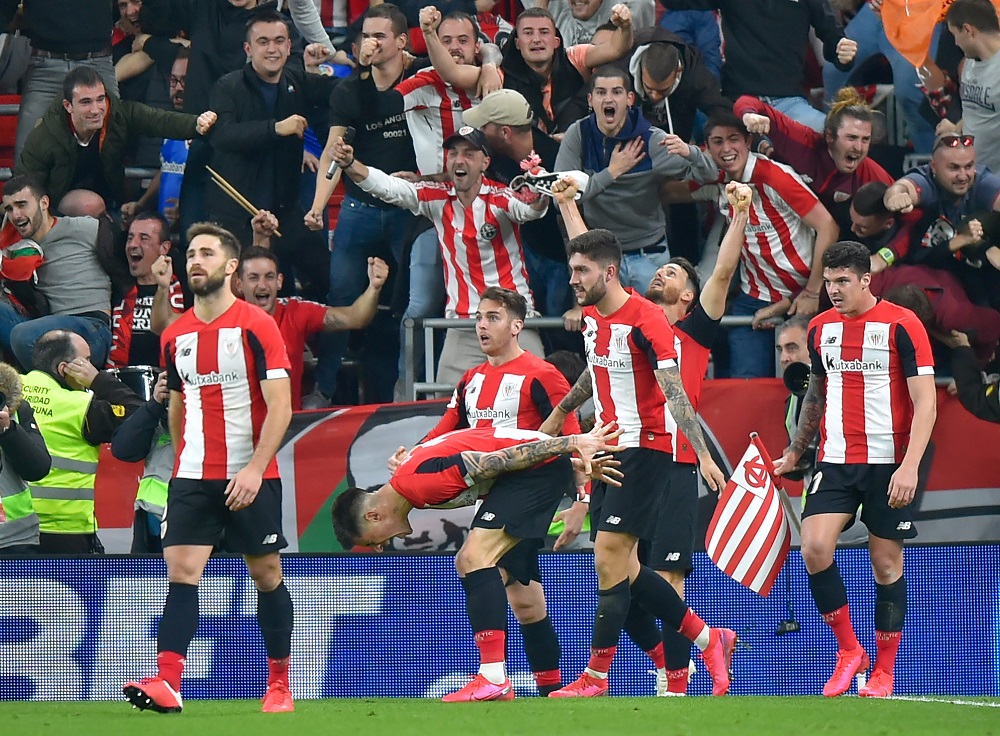 Athletic Bilbaou00e2u20acu2122s players celebrate Spanish forward Inaki Williamsu00e2u20acu2122 goal during the Spanish Copa del Rey (Kingu00e2u20acu2122s Cup) quarter-final football match Athletic Club Bilbao against FC Barcelona at the San Mames stadium in Bilbao February 6, 2020. u00e2u20acu201d AFP