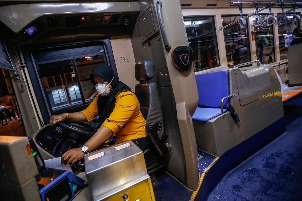 A bus driver is seen wearing a face mask in Kuala Lumpur February 7, 2020.