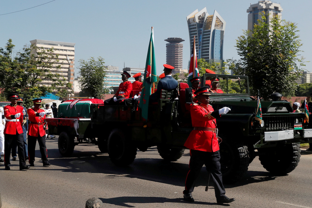 Military officers escort a gun carriage carrying the coffin of late former Kenya's President Daniel Arap Moi, draped in the national flag, during a state funeral procession to the Nyayo Stadium in Nairobi February 11, 2020. u00e2u20acu201d Reuters pic