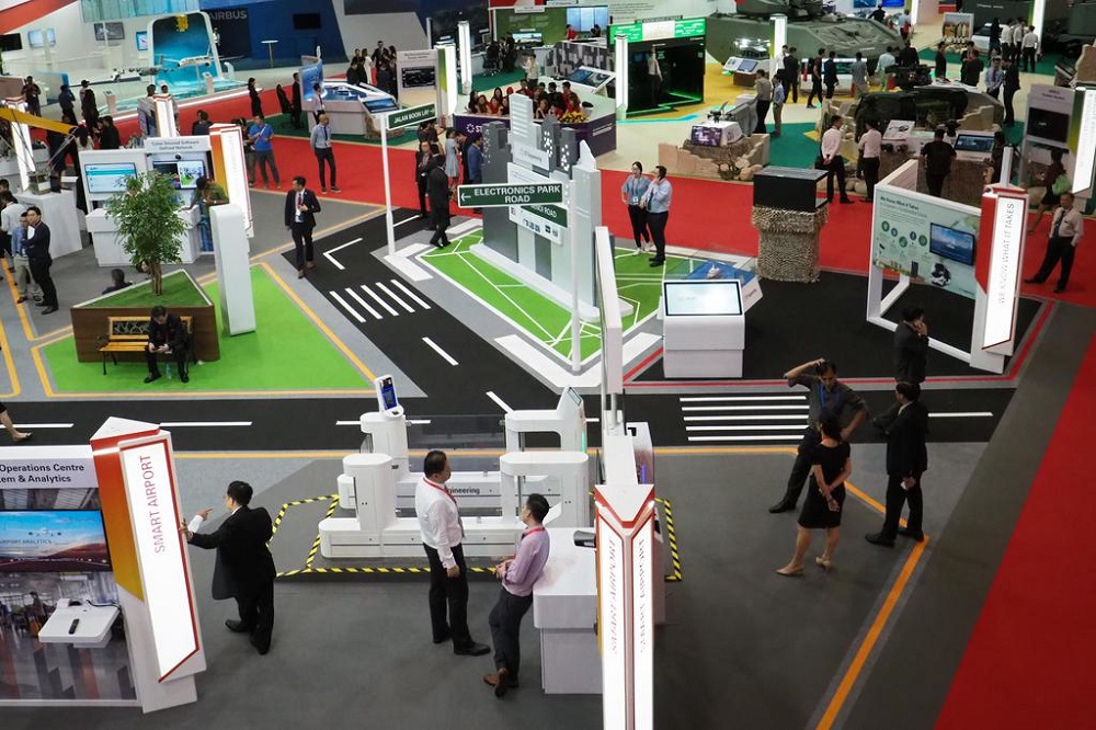 Visitors to the Singapore Airshow exhibition hall on February 13. u00e2u20acu201d TODAY pic