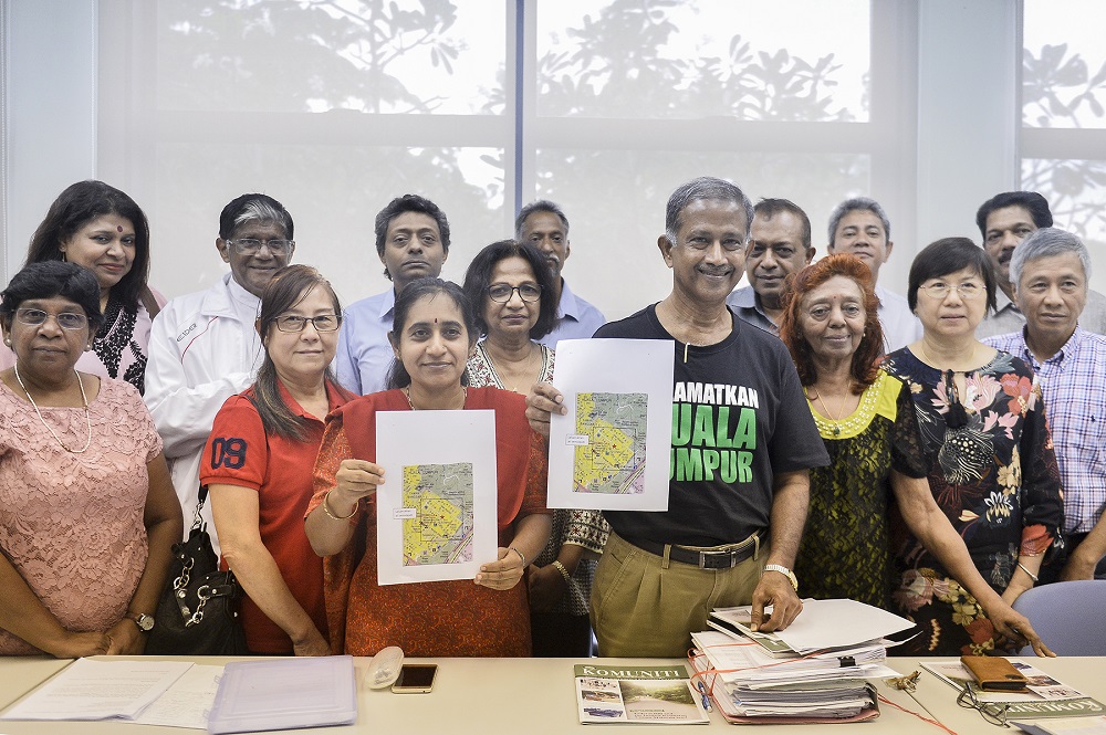 Residents pose for a group photo after a press conference at the Bukit Bandaraya Community Hall in Kuala Lumpur February 18,2020. u00e2u20acu201d Picture by Miera Zulyana