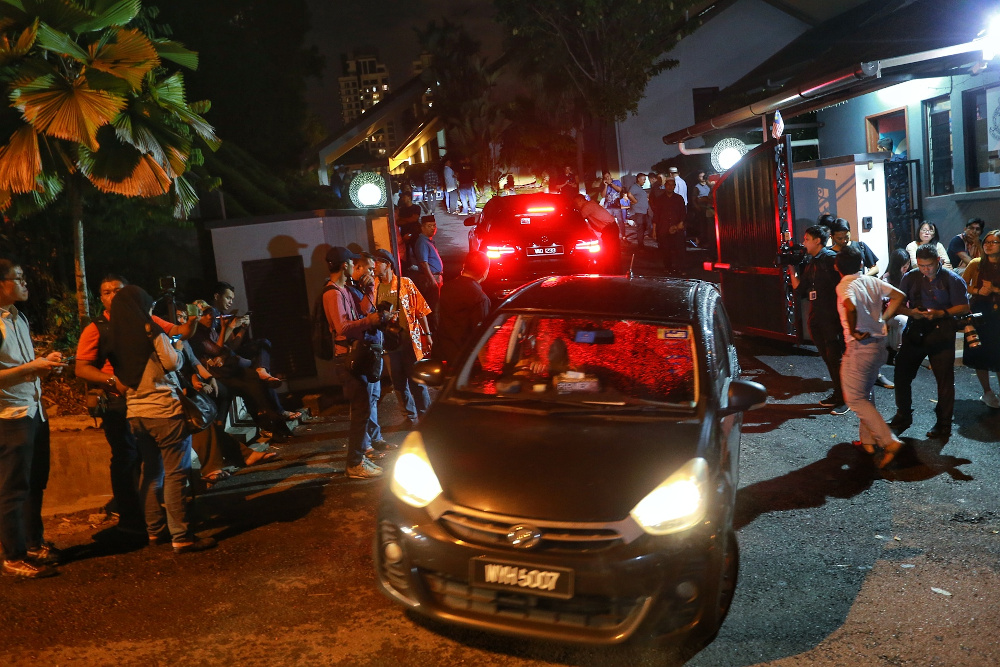 Media personnel waiting outside Datuk Seri Anwar Ibrahim’s house in Segambut February 23, 2020. — Picture by Ahmad Zamzahuri