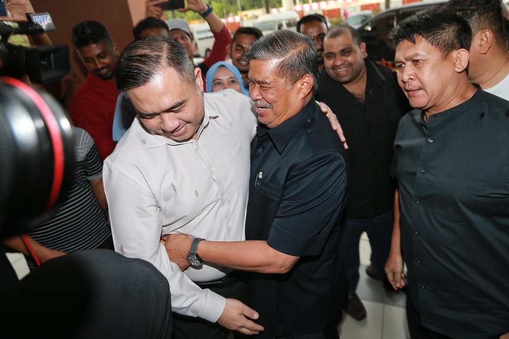 DAPu00e2u20acu2122s Anthony Loke (left) and Amanah president Mohamad Sabu greet each other as they arrive for the Pakatan Harapan Presidential Council Meeting at PKRu00e2u20acu2122s headquarters in Kuala Lumpur February 25,2020. u00e2u20acu201d Picture by Ahmad Zamzahuri