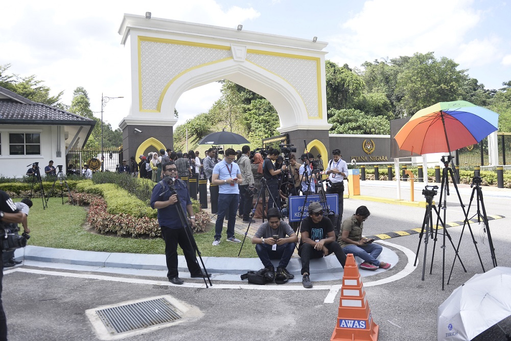 Members of the media gather in front of the Istana Negara to wait for the arrival of Barisan National and PAS MPs, in Kuala Lumpur February 25, 2020. — Picture by Miera Zulyana