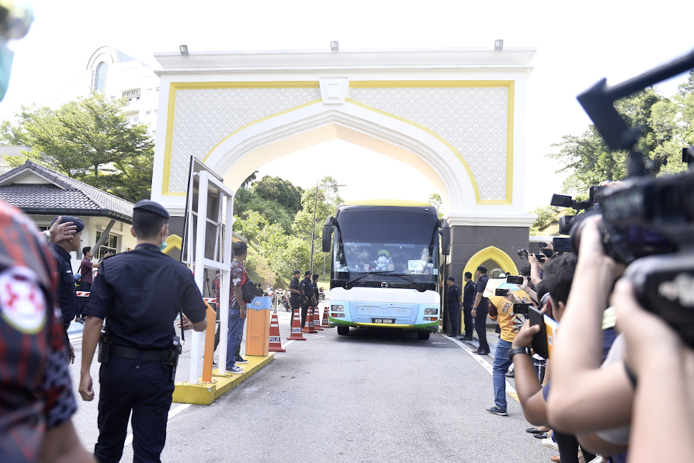 A bus carrying members of DAP is seen leaving Istana Negara on February 26, 2020. u00e2u20acu201d Picture by Miera Zulyana